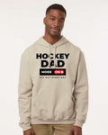 Man wearing a beige hoodie with 'Hockey Dad Mode On All Day Every Day' text on a white background